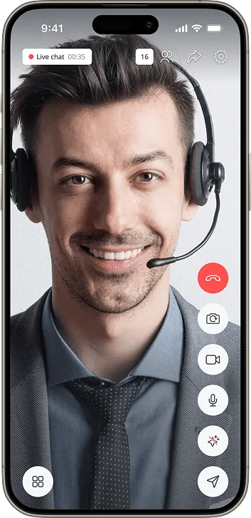 Smartphone screen showing a live video call with a man in a suit wearing a headset, call duration, and various call control icons.