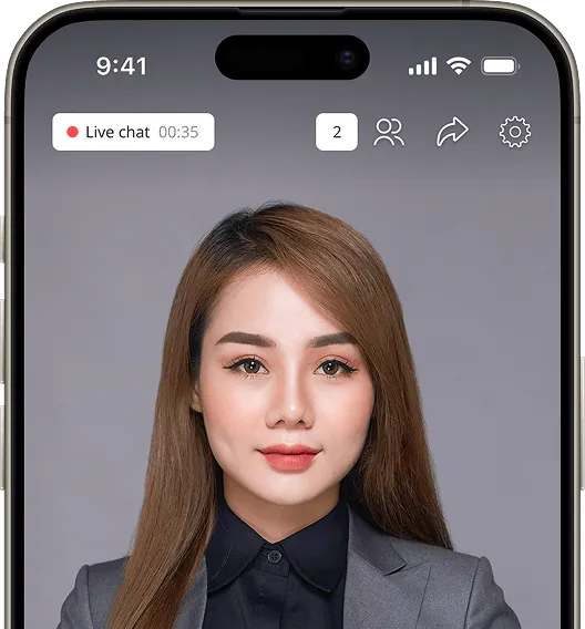 Video call screen on a smartphone showing a woman with long brown hair in a business suit, with live chat active for 35 seconds.