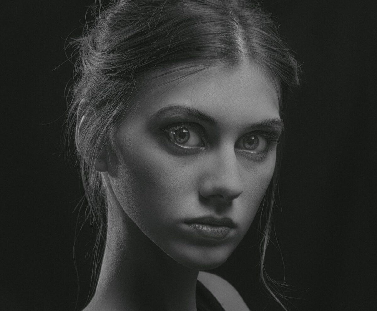 a black and white photo of a woman's face
