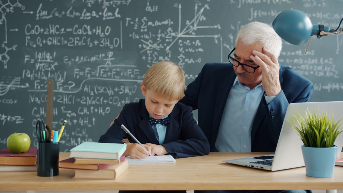 Teacher planning a lesson at a desk